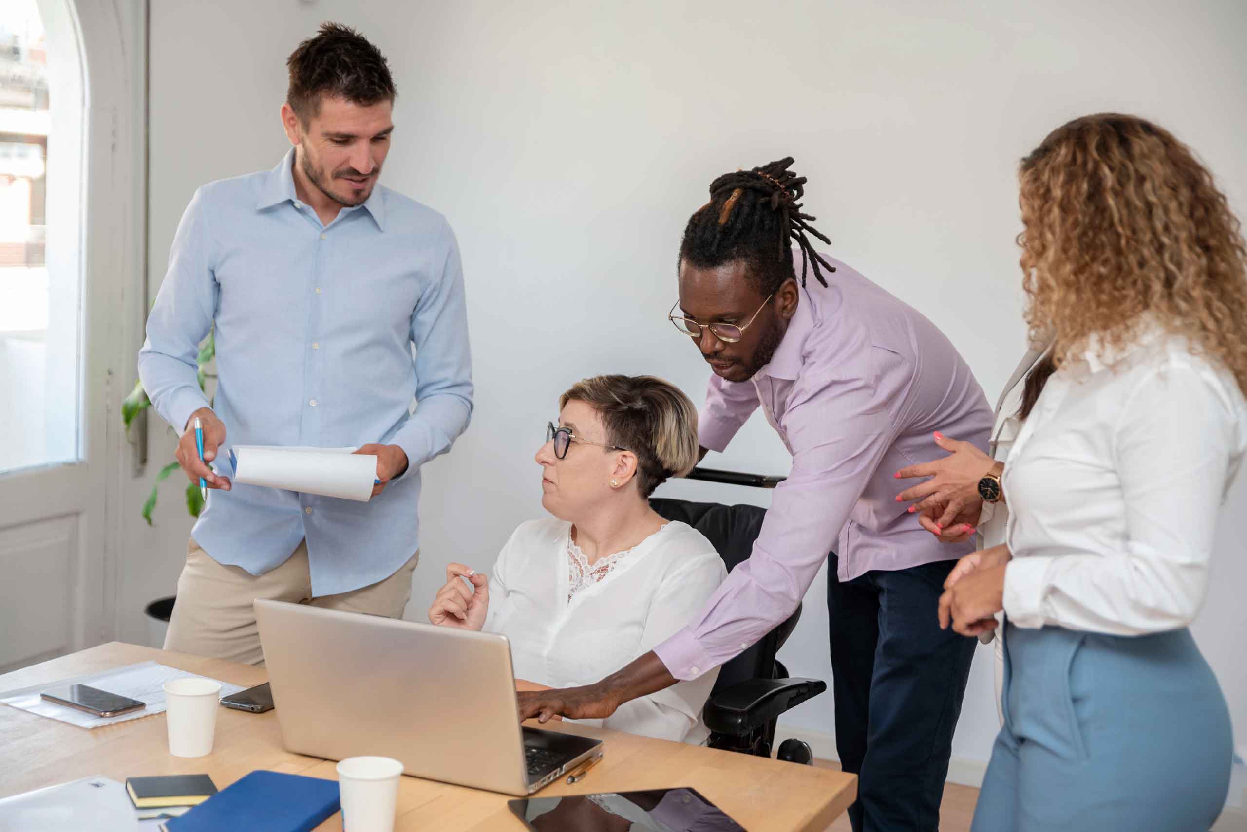 group of multiracial entrepreneurs gathered around 2025 03 13 01 26 15 utc.jpg